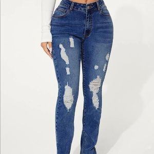 Ripped slit hem skinny jeans